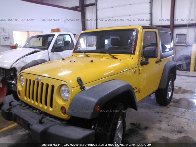 1J4AA2D17BL529375 - 2011 JEEP WRANGLER SPORT YELLOW photo 2