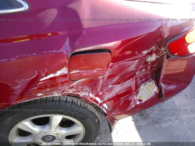 2T1CF22P71C481552 - 2001 TOYOTA CAMRY SOLARA SE/SLE წითელი ფოტო 6