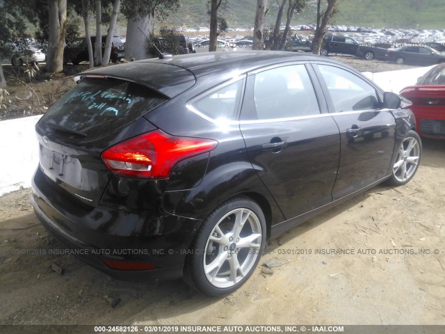 1FADP3N21GL319267 - 2016 FORD FOCUS TITANIUM BLACK photo 4