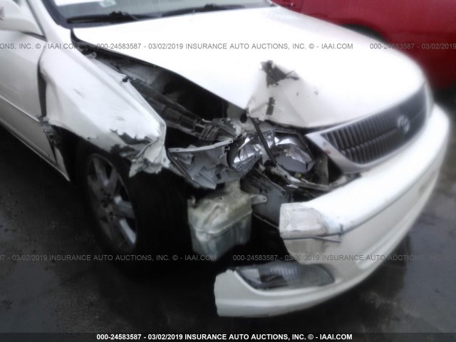 4T1BF28B7YU033859 - 2000 TOYOTA AVALON XL/XLS WHITE photo 6