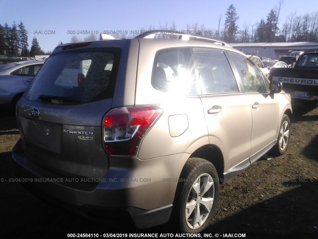 JF2SJABC5GH546812 - 2016 SUBARU FORESTER 2.5I SILVER photo 4