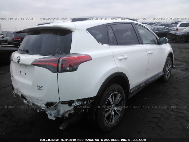 2T3RFREV3JW707704 - 2018 TOYOTA RAV4 ADVENTURE/XLE WHITE photo 4