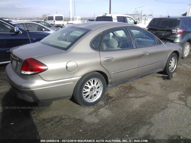 1FAFP55U74A171655 - 2004 FORD TAURUS SES BROWN photo 4