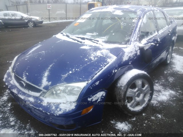 1FAFP34N85W122547 - 2005 FORD FOCUS ZX4 BLUE photo 6