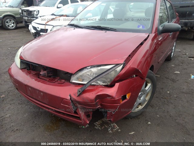 1FAHP34N05W282740 - 2005 FORD FOCUS ZX4 RED photo 6