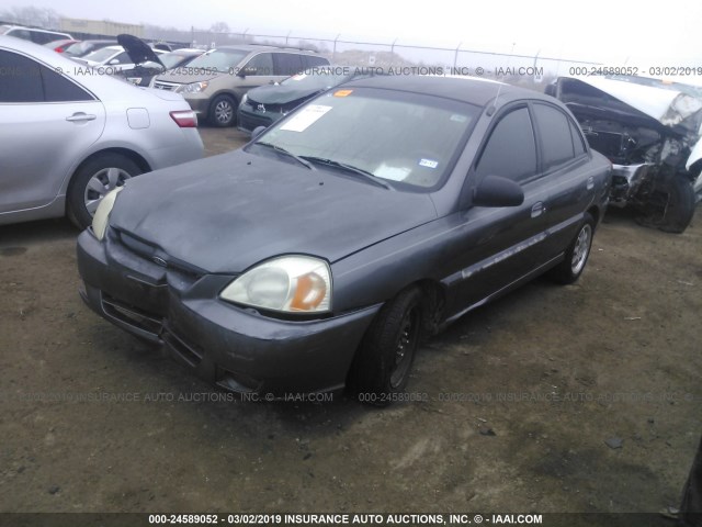 KNADC125636274793 - 2003 KIA RIO GRAY photo 2