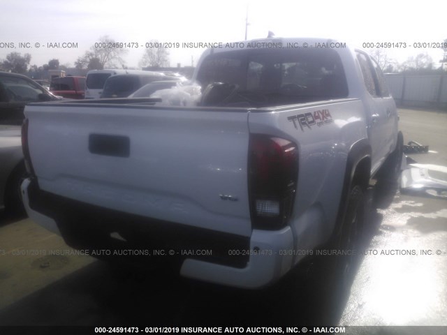 3TMCZ5AN9JM166154 - 2018 TOYOTA TACOMA DBL CAB/SR/TRDSPT/OR/PRO WHITE photo 4