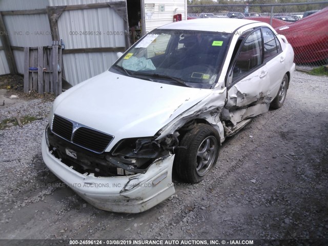 JA3AJ86E62U037955 - 2002 MITSUBISHI LANCER OZ RALLY WHITE photo 6