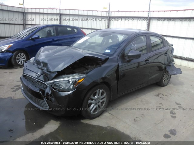 3MYDLBZV1GY134892 - 2016 TOYOTA SCION IA GRAY photo 2