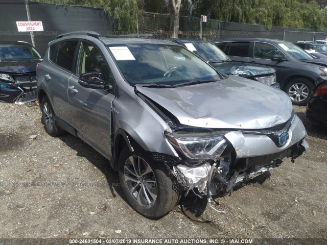 JTMRJREV4HD136374 - 2017 TOYOTA RAV4 HV LE/XLE SILVER photo 1