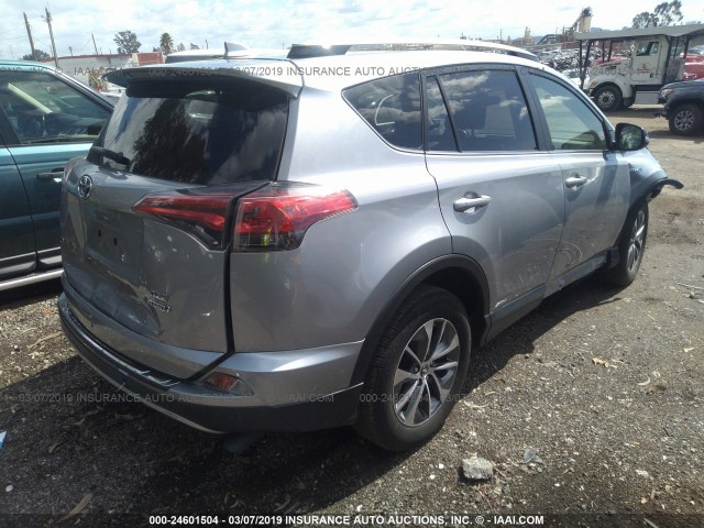 JTMRJREV4HD136374 - 2017 TOYOTA RAV4 HV LE/XLE SILVER photo 4