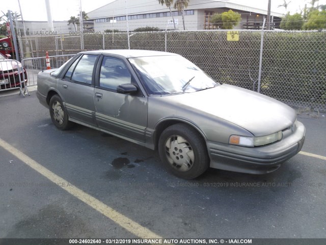 1G3WH52M9VF305811 - 1997 OLDSMOBILE CUTLASS SUPREME SL GRAY photo 1