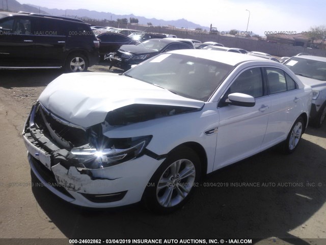 1FAHP2E89GG112120 - 2016 FORD TAURUS SEL WHITE photo 2