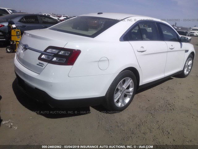 1FAHP2E89GG112120 - 2016 FORD TAURUS SEL WHITE photo 4