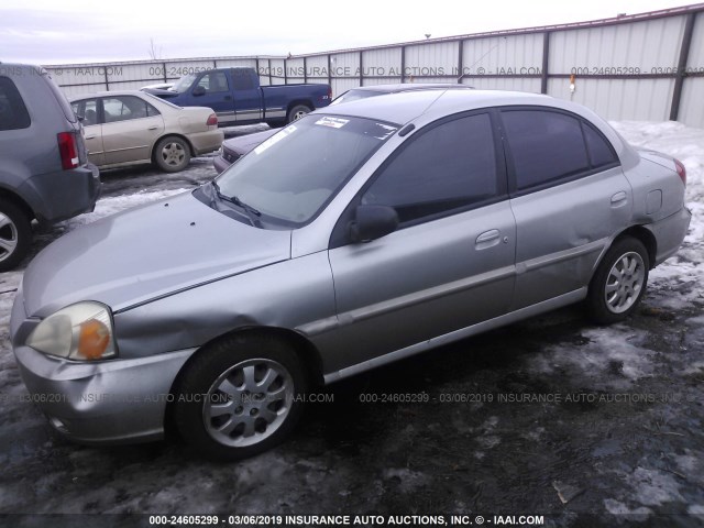 KNADC125946343168 - 2004 KIA RIO SILVER photo 6