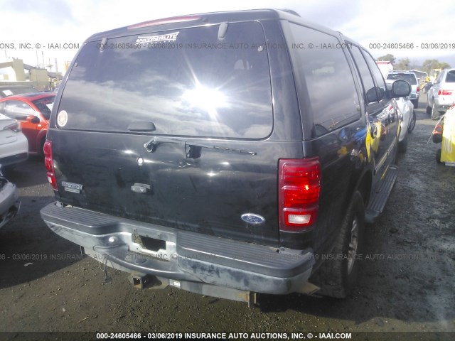 1FMPU16L12LA76673 - 2002 FORD EXPEDITION XLT BLACK photo 4