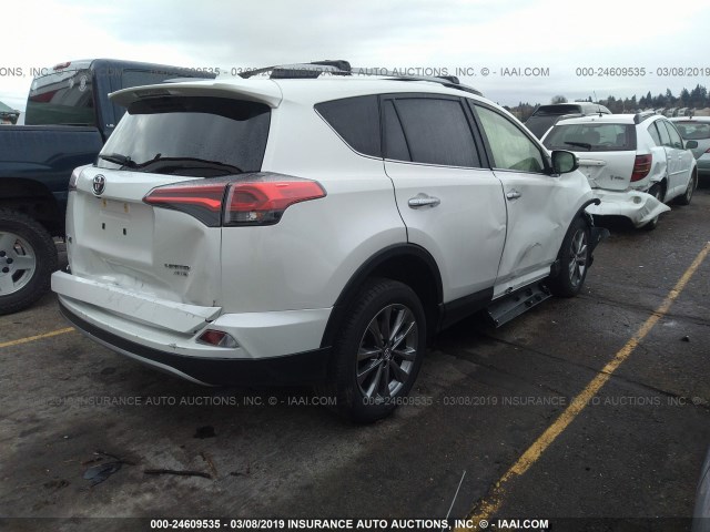 JTMDFREV9JJ748069 - 2018 TOYOTA RAV4 LIMITED/SE/PLATINUM WHITE photo 4