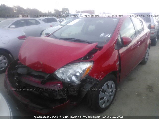 JTDKDTB32D1544781 - 2013 TOYOTA PRIUS C RED photo 2