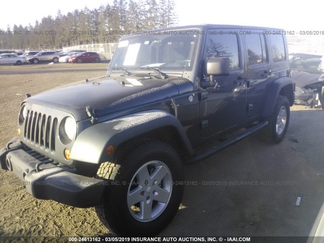 1J4BA3H19AL131300 - 2010 JEEP WRANGLER UNLIMITED SPORT BLACK photo 2