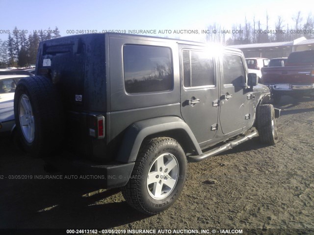 1J4BA3H19AL131300 - 2010 JEEP WRANGLER UNLIMITED SPORT BLACK photo 4