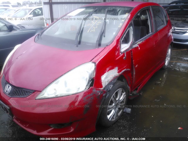 JHMGE88409S016334 - 2009 HONDA FIT SPORT RED photo 6