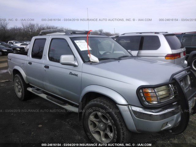 1N6ED27Y9YC419859 - 2000 NISSAN FRONTIER CREW CAB XE/CREW CAB SE SILVER photo 1