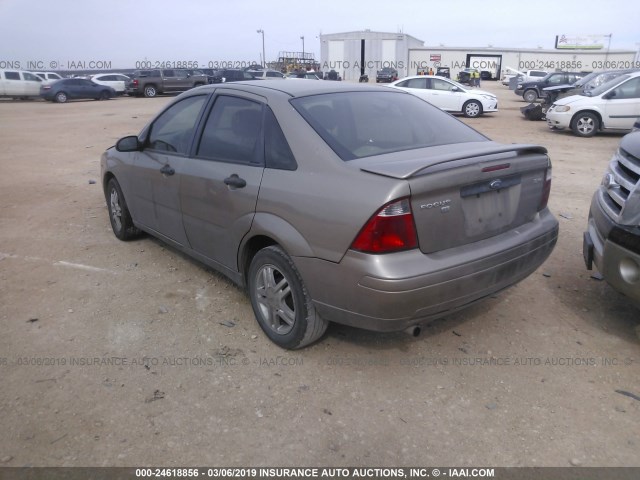 1FAFP34NX5W122159 - 2005 FORD FOCUS ZX4 TAN photo 3