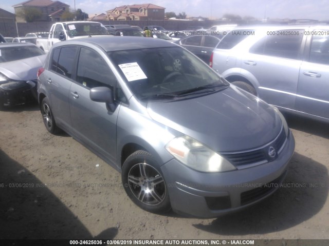 3N1BC13EX9L400549 - 2009 NISSAN VERSA S/SL SILVER photo 1