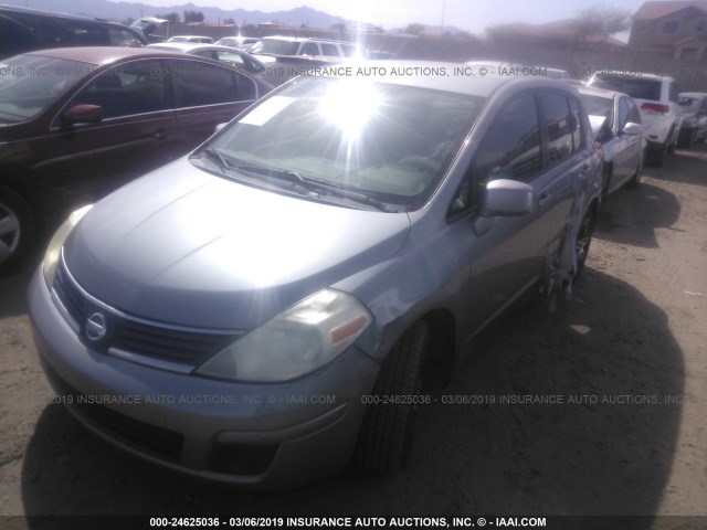 3N1BC13EX9L400549 - 2009 NISSAN VERSA S/SL SILVER photo 2