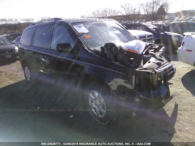 KNDMG4C37A6349570 - 2010 KIA SEDONA LX BLACK photo 1