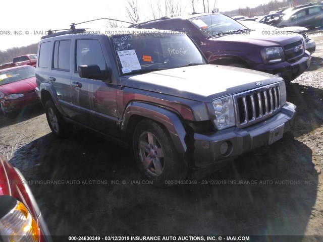 1J8HG48P97C591986 - 2007 JEEP COMMANDER GRAY photo 1