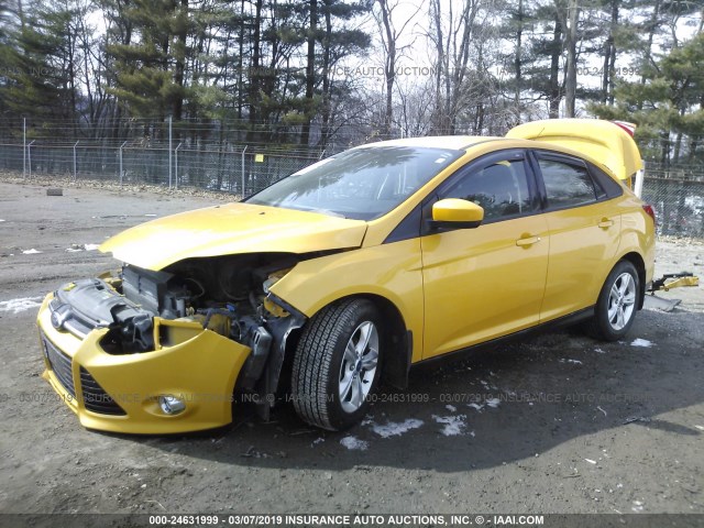 1FAHP3F29CL283578 - 2012 FORD FOCUS SE YELLOW photo 2