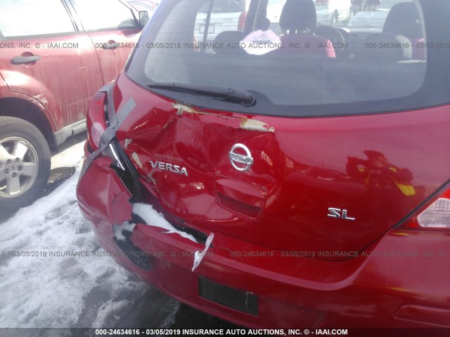 3N1BC13E09L419207 - 2009 NISSAN VERSA S/SL RED photo 6