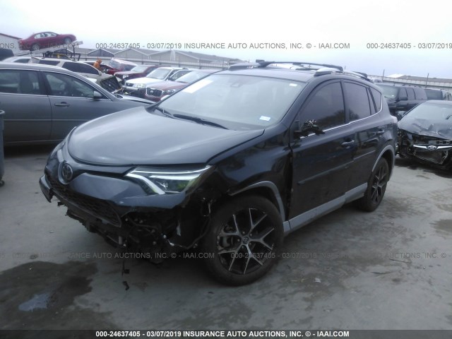 JTMNFREV1GJ075081 - 2016 TOYOTA RAV4 SE BLACK photo 2