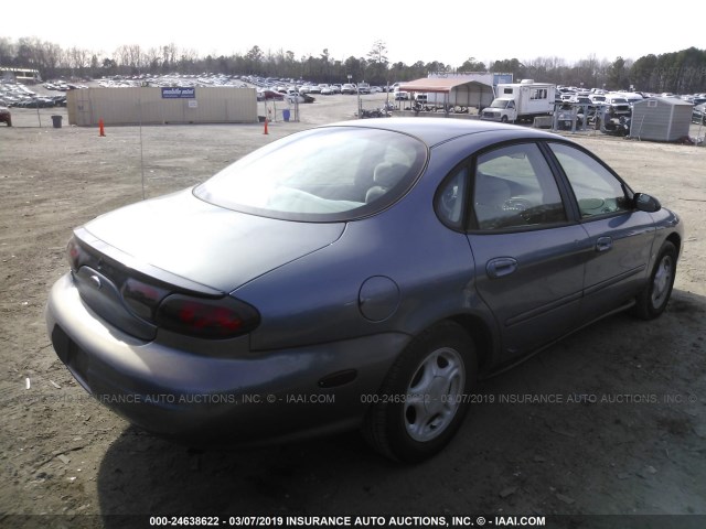 1FAFP53S0XA104059 - 1999 FORD TAURUS SE/COMFORT/SPORT BLUE photo 4