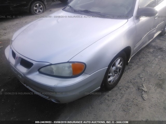 1G2NE52F84M581045 - 2004 PONTIAC GRAND AM SE GRAY photo 2