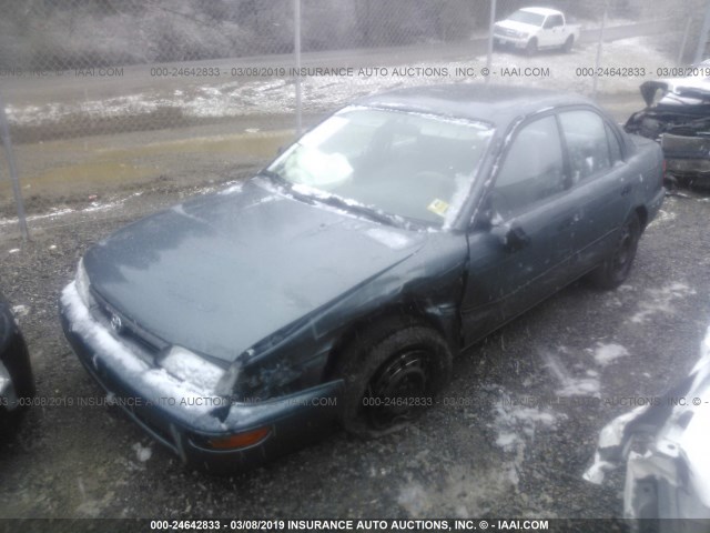 1NXAE09B5SZ331660 - 1995 TOYOTA COROLLA LE/DX TEAL photo 2