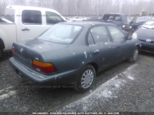 1NXAE09B5SZ331660 - 1995 TOYOTA COROLLA LE/DX TEAL photo 4