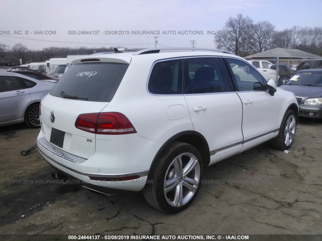 WVGGF7BP4HD004312 - 2017 VOLKSWAGEN TOUAREG EXECUTIVE WHITE photo 4