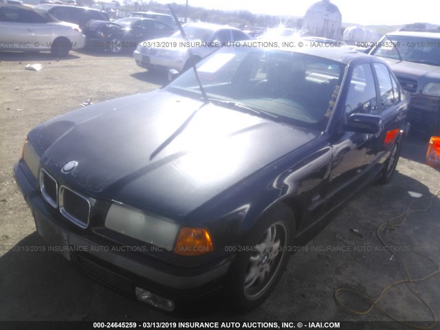 4USCD2327TLB31114 - 1996 BMW 328 I AUTOMATIC BLACK photo 2