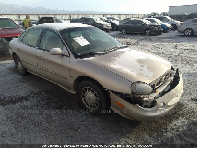 1FAFP53S7XG325204 - 1999 FORD TAURUS SE/COMFORT/SPORT TAN photo 1