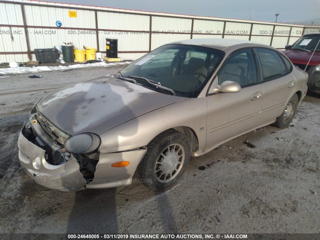 1FAFP53S7XG325204 - 1999 FORD TAURUS SE/COMFORT/SPORT TAN photo 2