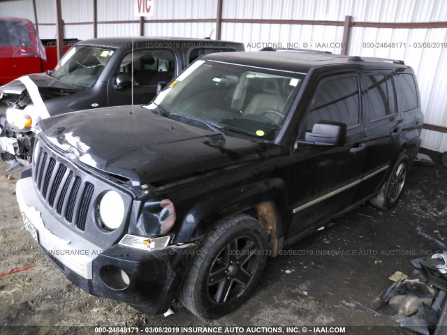 1J4FF48B49D153504 - 2009 JEEP PATRIOT LIMITED BLACK photo 2