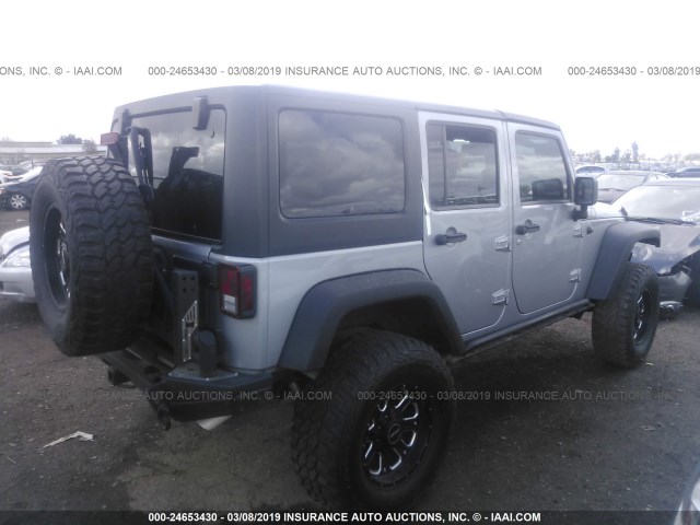 1C4BJWDG6DL702411 - 2013 JEEP WRANGLER UNLIMITED SPORT GRAY photo 4