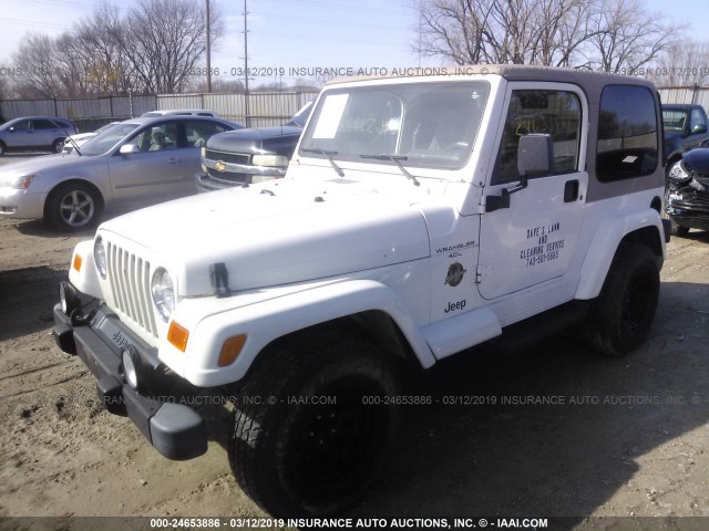 1J4FA59SXYP753072 - 2000 JEEP WRANGLER / TJ SAHARA WHITE photo 2