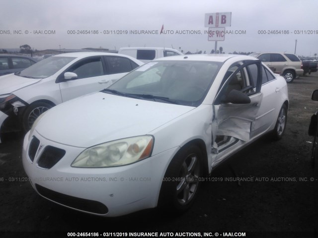 1G2ZH558664159266 - 2006 PONTIAC G6 GT WHITE photo 6