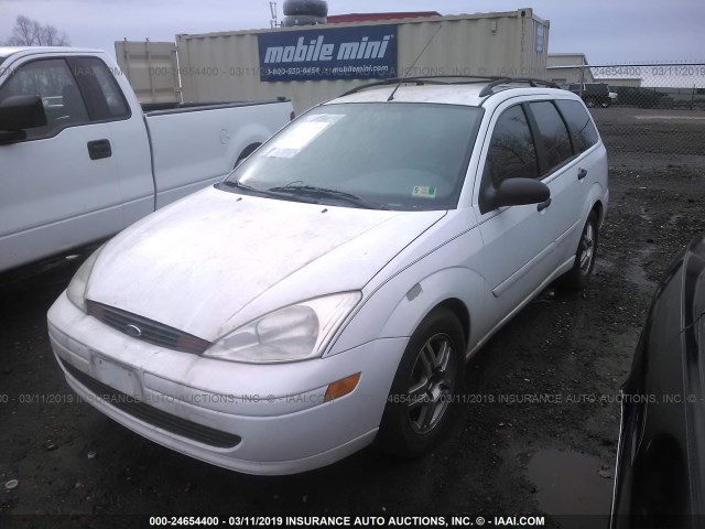 1FAHP36P8YW109003 - 2000 FORD FOCUS SE/SE COMFORT WHITE photo 2