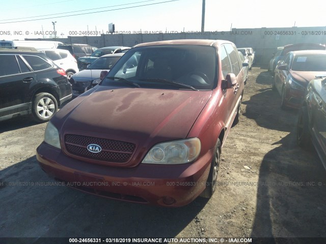 KNDUP131446568360 - 2004 KIA SEDONA EX/LX BURGUNDY photo 6