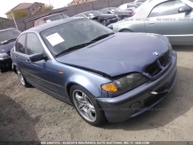 WBAEV53432KM00092 - 2002 BMW 330 I BLUE photo 1