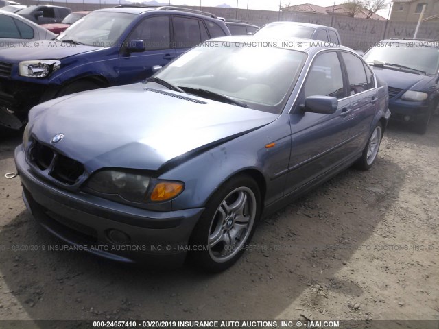 WBAEV53432KM00092 - 2002 BMW 330 I BLUE photo 2